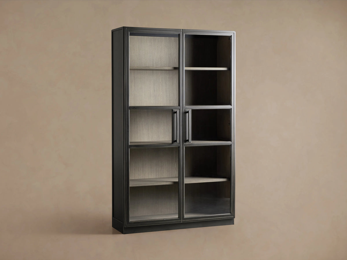 Factory Cabinet with dark Usine Black finish, glass-paneled doors, iron handles, and chic grey interior shelves.