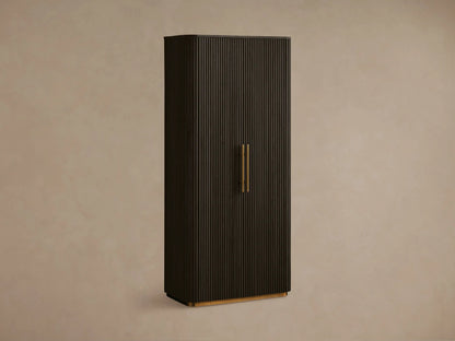 Dark Ebony Finnley Cabinet with fluted right door, brass pulls & plinth base. Left door open, shelves with decor visible.