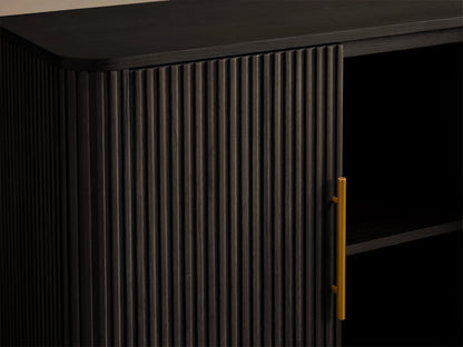 Finnley Wood Sideboard in ebony finish with ribbed texture, open door showing shelves, brass-finished handles, against neutral background.