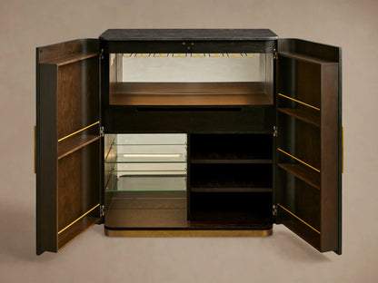Brass-finished glass rack inside Finnley Plinth Bar Cabinet with hanging wine glasses, illuminated by an LED light.