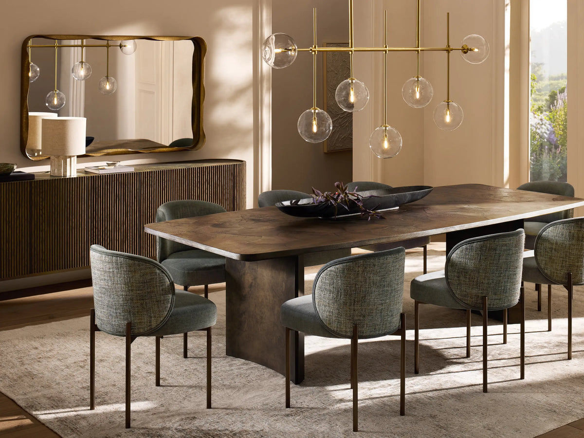 Flore Sideboard showcasing a round inlaid stone top with a unique marble pattern, resting on a solid oak wood frame with reeded detailing.