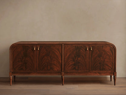 Frances Sideboard, dark mahogany with book-matched flame veneer on 4 doors, brass pulls, rounded corners, tapered legs.