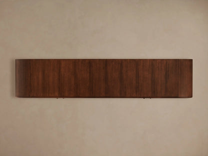 Frances Sideboard: Dark mahogany wood with figured veneer, vintage brass pull, and open cabinet with stacked white plates.