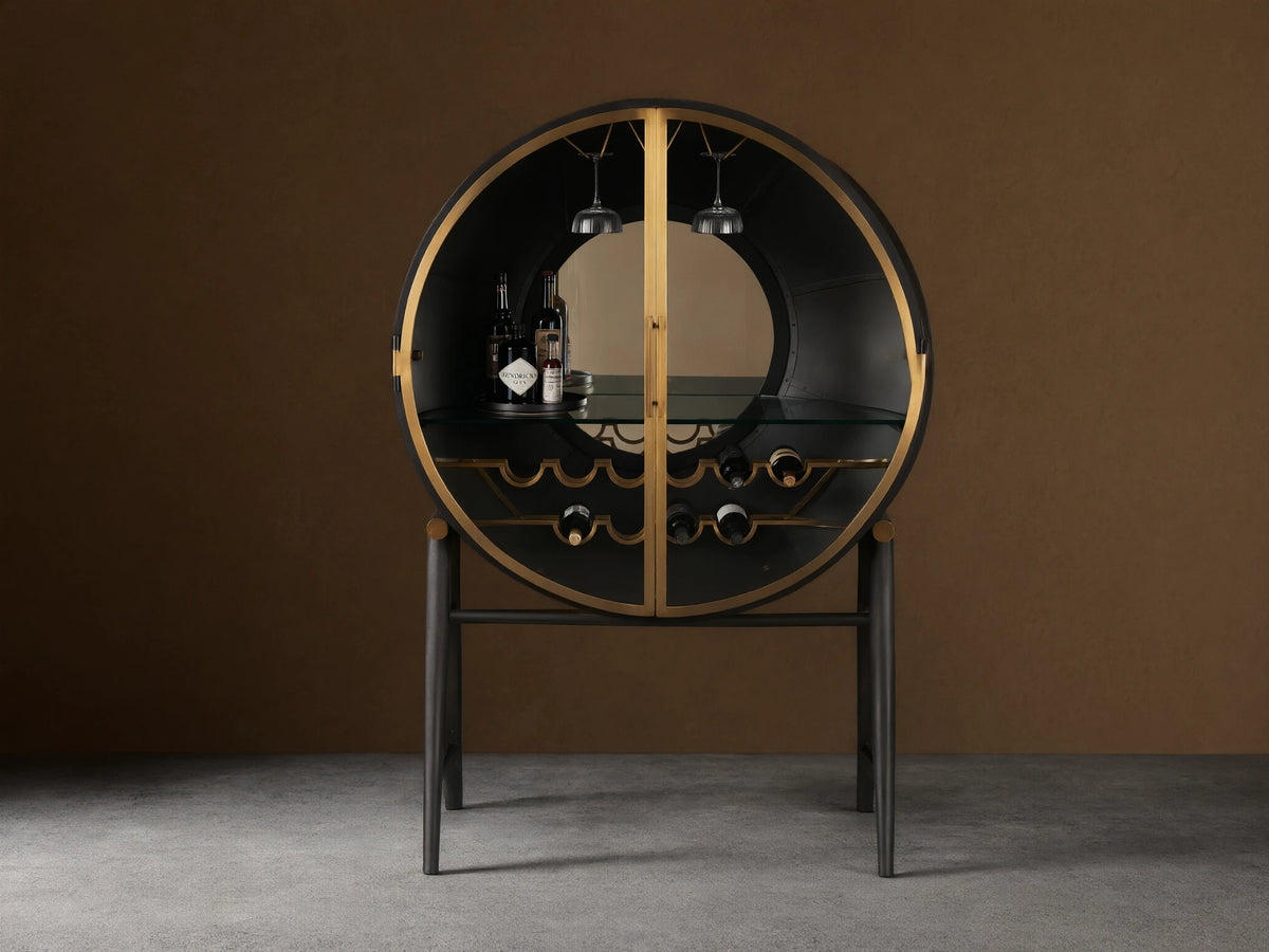 Circular Gideon Bar Cabinet with open doors, featuring dark wood interior, gold accents, built-in glass rack, and bottles inside.