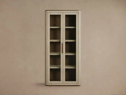 Front view of the Cove Harrow Cabinet, a tall rectangular cabinet with two glass doors, faux shagreen finish, and brass handles.