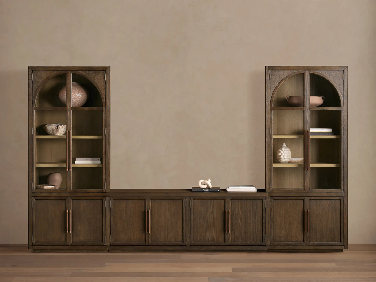 Hattie Glass Media Cabinet: A long, dark brown wood media system with two tall arched glass-door cabinets and lower solid wood cabinets.