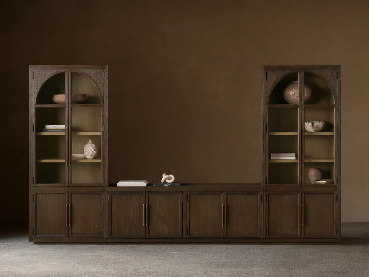 Hattie Glass Media Cabinet: A long, dark brown wood media system with two tall arched glass-door cabinets and lower solid wood cabinets.