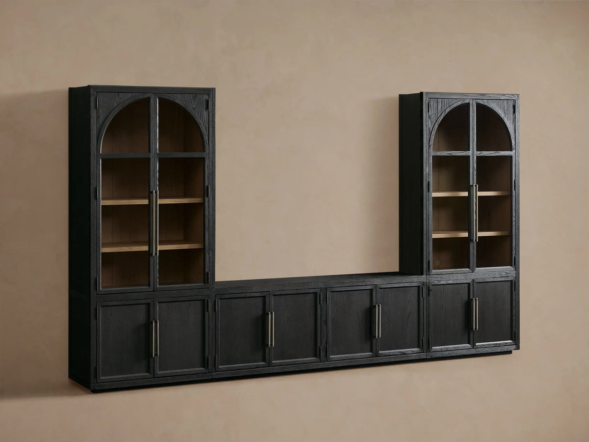 Dark oak Hattie Glass Media Cabinet with two tall arched glass-door cabinets, a central console, and reeded hardware.