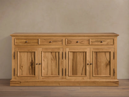 Front view of the Kensington Reclaimed Buffet, natural reclaimed French oak wood, with four drawers and four cabinet doors, antique brass pulls.