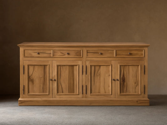 Front view of the Kensington Reclaimed Buffet, natural reclaimed French oak wood, with four drawers and four cabinet doors, antique brass pulls.