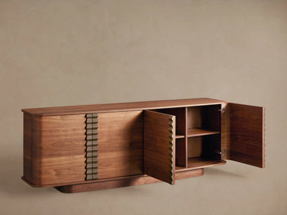 Walnut Ribbon Sideboard with rounded corners, featuring four doors and dark sculptural ribbon pulls.