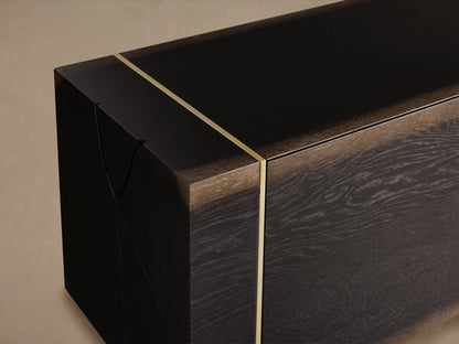 Mihaela Media Console with dark brown wood grain, gold metal trim, and subtle hand-carved detailing on the edges.