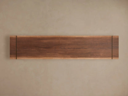 Close-up of Mihaela Media Console in Walnut, with an open door revealing shelves holding a gray vase and books.