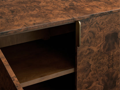 Morley Sideboard with swirling walnut burl veneer, open door showing interior shelf, brass-finished pull visible.