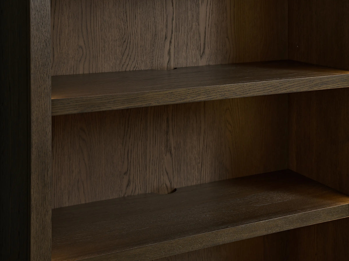 Close-up of the Nason Modular Hutch Cabinet's interior, showing two dark brown mocha-finished oak shelves with visible wood grain.