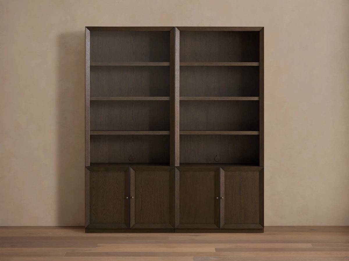 Nason Modular Hutch Cabinet in Mocha finish. Two dark oak units with open shelving & lower cabinet doors against a light wall.