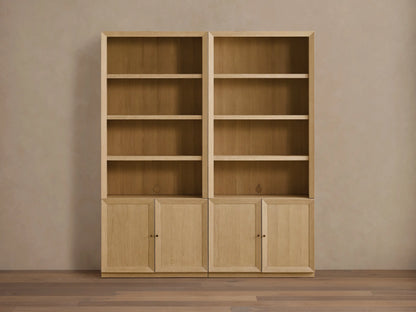 Side-by-side Nason Modular Hutch Cabinets in light sand oak. Each has open shelves above two base cabinets with aged nickel pulls.