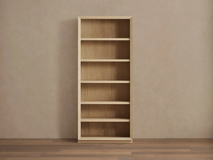 Nason Modular Bookcase in sand white oak, with 6 shelves, recessed LED lighting, and decorative items on display.