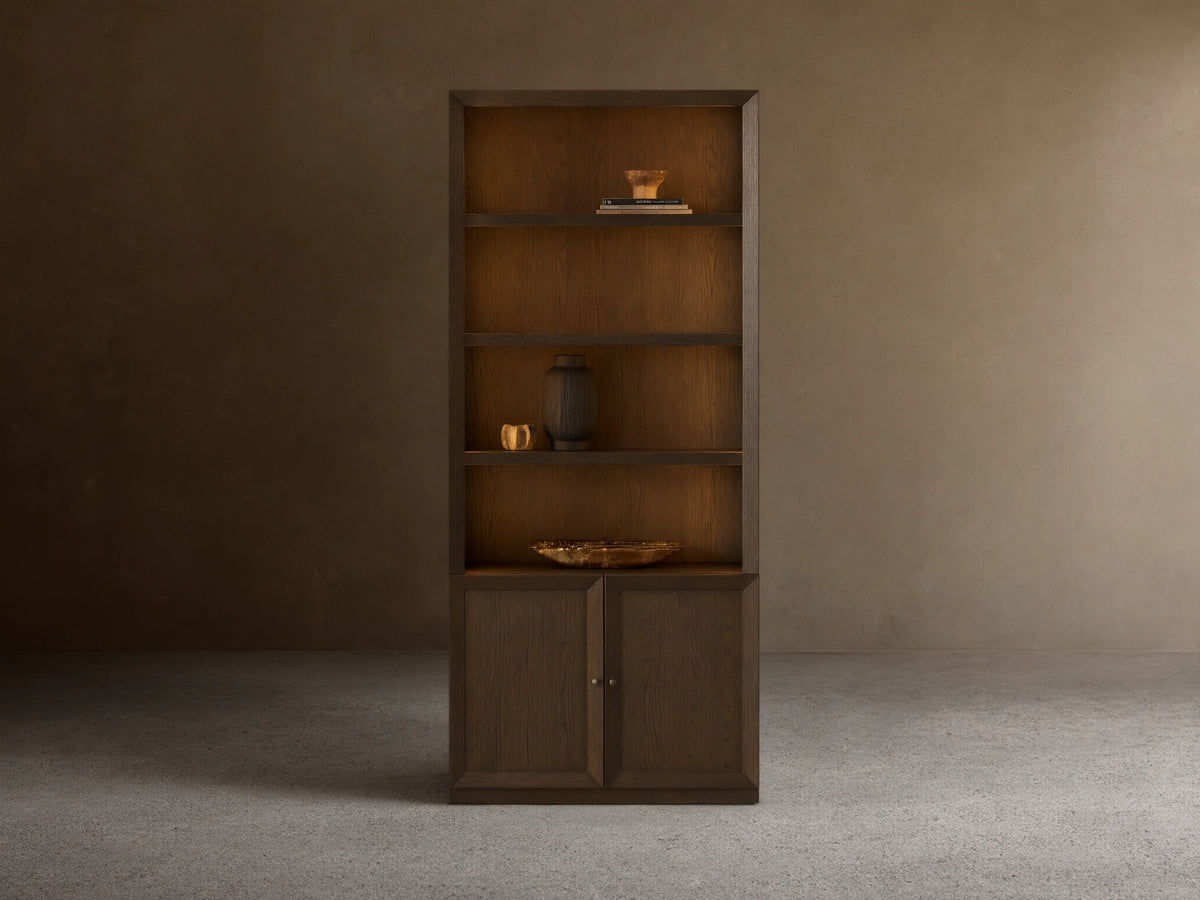 Dark mocha Nason Modular Hutch Cabinet, open shelves with decor, two closed doors with aged nickel pulls.