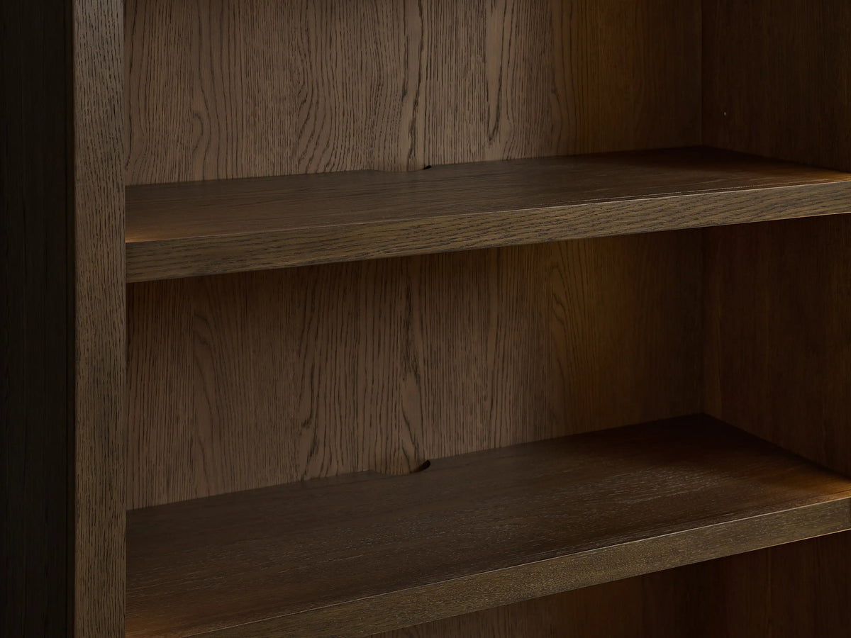Close-up of Nason Modular Hutch Cabinet's dark mocha oak interior, showing two empty horizontal shelves with wood grain.