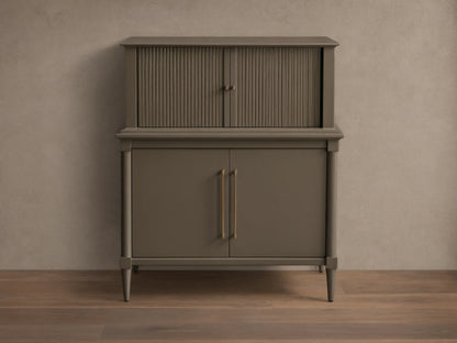 Front view of the dark gray-green Oakleigh Bar Cabinet, featuring reeded upper doors, solid lower doors, and brass pulls.
