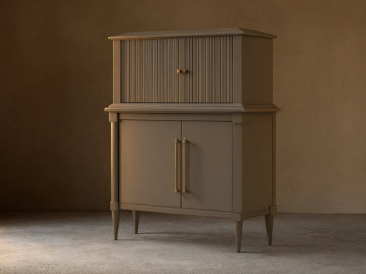 Front view of the dark gray-green Oakleigh Bar Cabinet, featuring reeded upper doors, solid lower doors, and brass pulls.