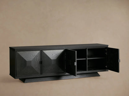 Ebony Pelham Sideboard. Two left doors closed with geometric pattern; two right doors open, revealing dark interior shelves.