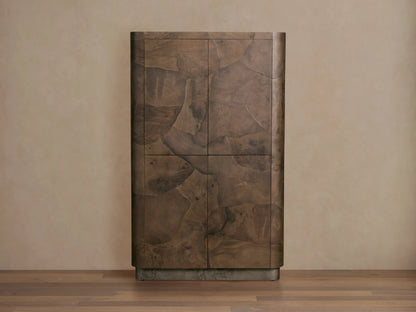 Polanco Cabinet in natural wood finish, showcasing oyster-cut patterns and unique graining. Stands on weathered steel base.