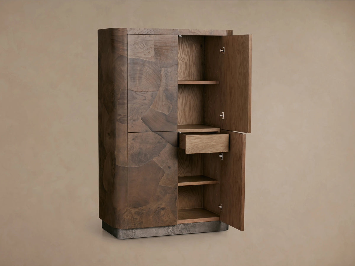 Polanco Cabinet made from oyster-cut wood, showcasing open doors with shelves and a drawer. Features a natural patina and distinct wood grain.