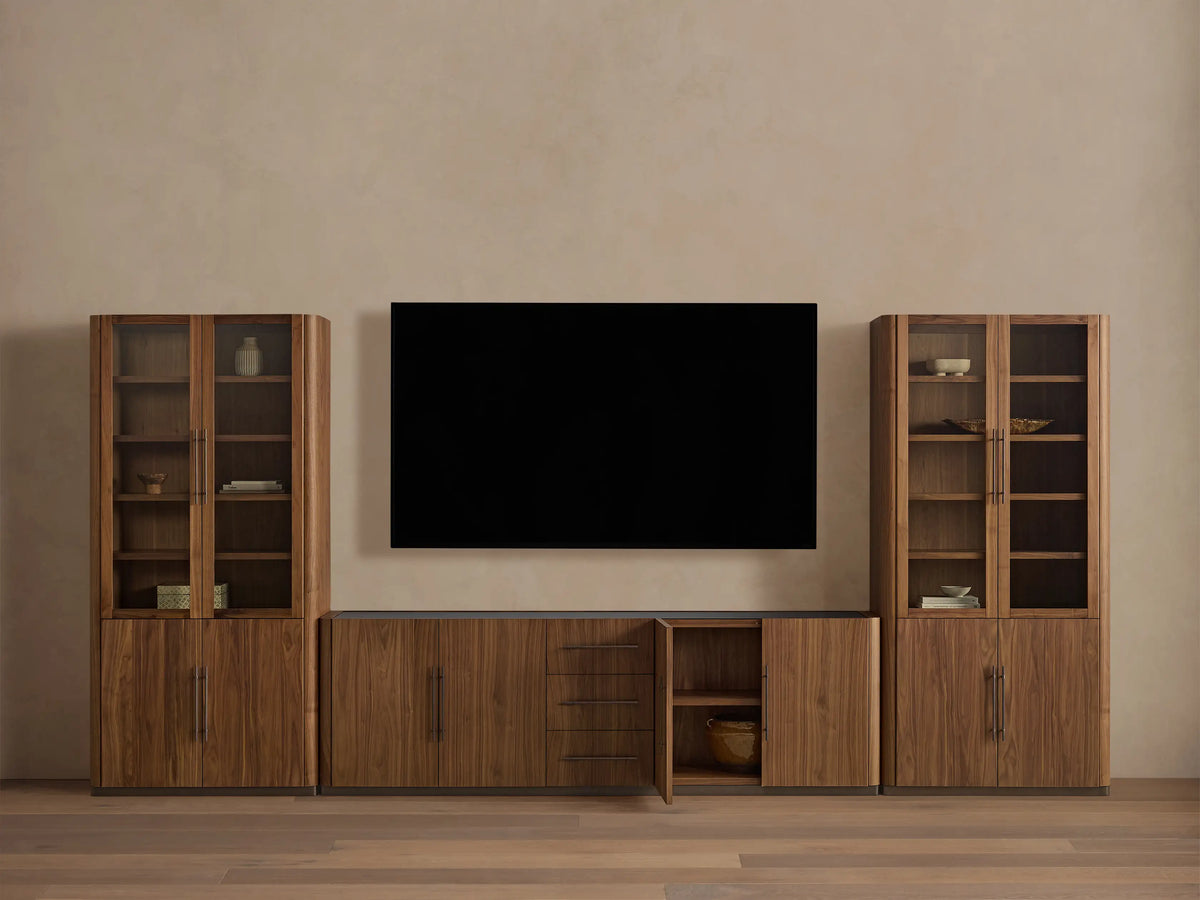 Piermont Modular Glass Media Cabinet Set: Dark walnut wood with two glass display cabinets flanking central console with drawers; TV above.
