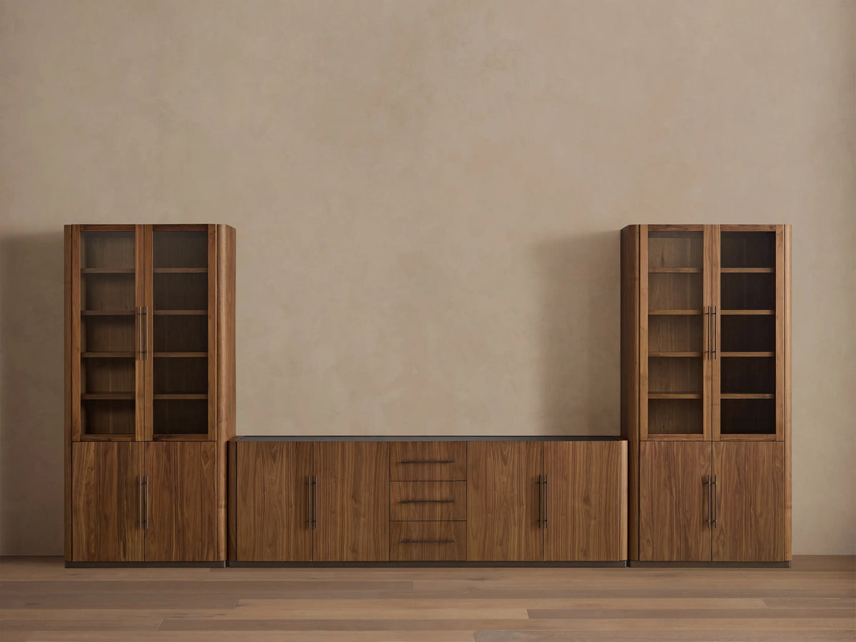 Piermont Modular Glass Media Cabinet Set: Dark walnut wood with two glass display cabinets flanking central console with drawers; TV above.