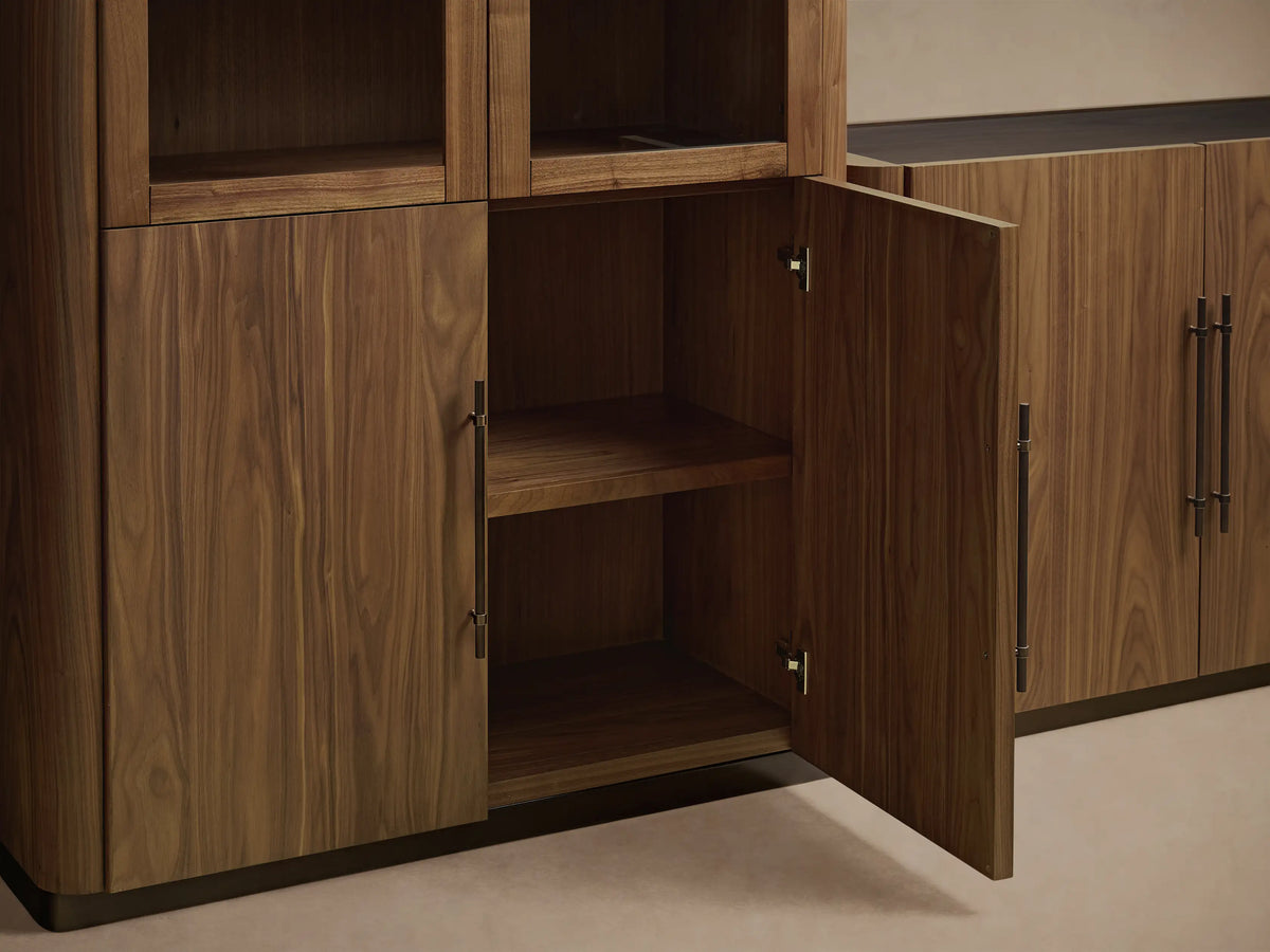 Dark walnut Piermont modular media cabinet set: two glass-top towers, center console with drawers, on a wood floor.
