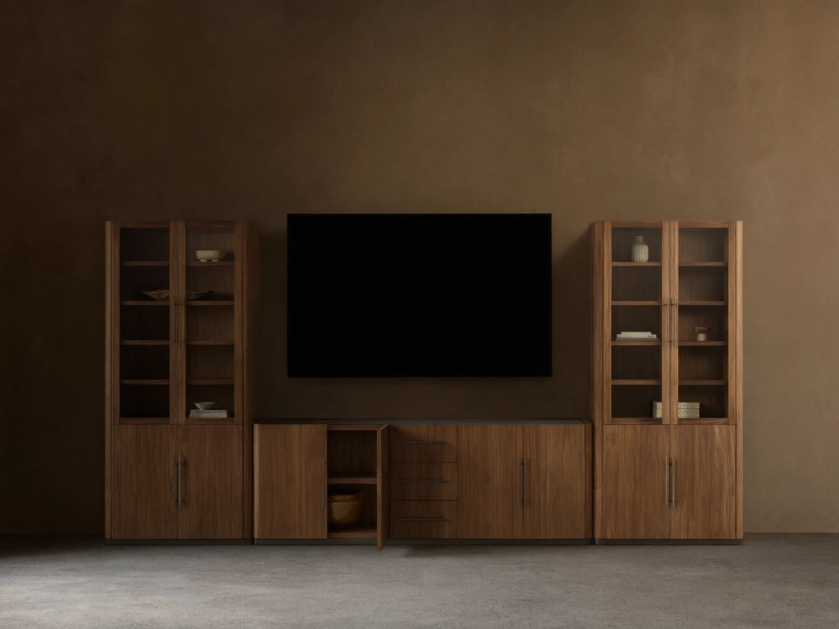 Piermont Modular Glass Media Cabinet Set: Dark walnut wood with two glass display cabinets flanking central console with drawers; TV above.