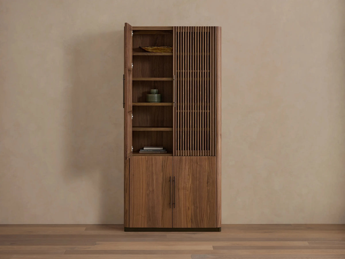 Piermont Modular Reeded Cabinet in dark walnut. Left door open shows shelves, reeded right door, and solid lower doors.