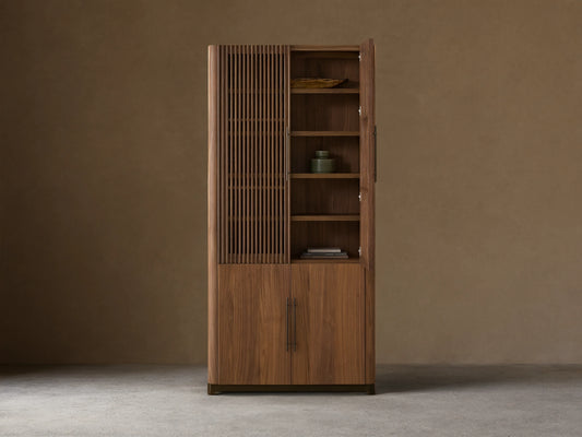 Piermont Modular Reeded Cabinet in dark walnut. Left door open shows shelves, reeded right door, and solid lower doors.