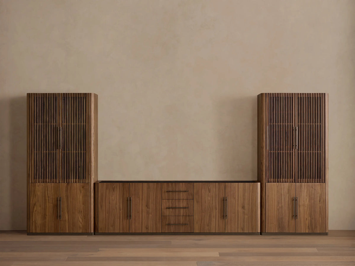 Piermont Modular Media Cabinet close-up: open walnut wood drawer with dark pull handle, dark top, and closed cabinet sections.