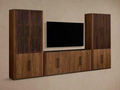 Piermont Modular Reeded Media Cabinet Set: Dark walnut wood set, central media console with black TV, two tall side cabinets with reeded doors ajar.