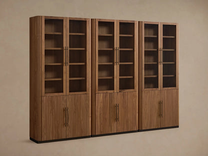 Warm brown Piermont Modular Glass Cabinet, showing walnut wood grain, glass doors with long bronze handles, and multiple interior shelves.