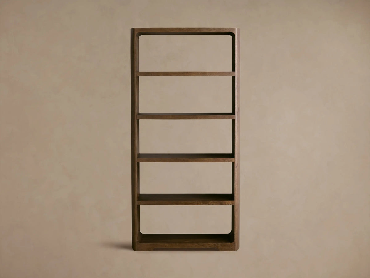 Front view of the dark brown Redding Bookcase, a tall, rectangular wooden unit with rounded corners and four fixed open shelves.