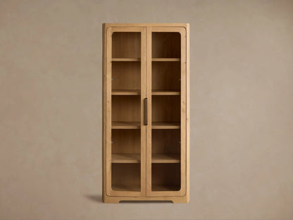 Front view of the natural reclaimed white oak Redding Glass Cabinet with two glass doors, four shelves, and antique brass hardware.