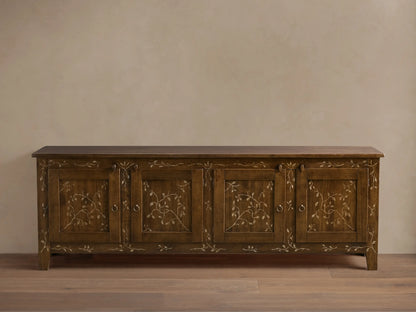 Front view of the brown Stefania Four-Door Buffet, featuring hand-painted gold vine decor and antique ring-pull hardware.