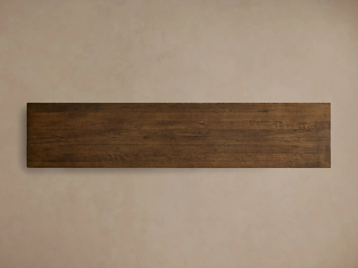 Close-up of the dark brown wood grain on the Stefania Four-Door Buffet.