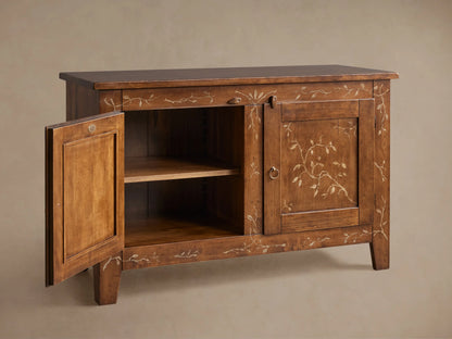 Stefania Buffet: brown poplar wood cabinet with two doors, hand-painted light vine decor, and antique bronze ring pull hardware.