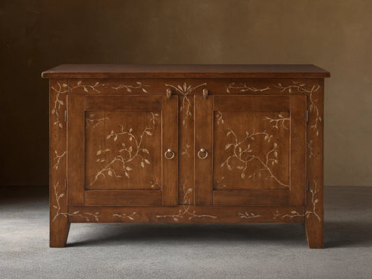 Stefania Buffet: brown poplar wood cabinet with two doors, hand-painted light vine decor, and antique bronze ring pull hardware.