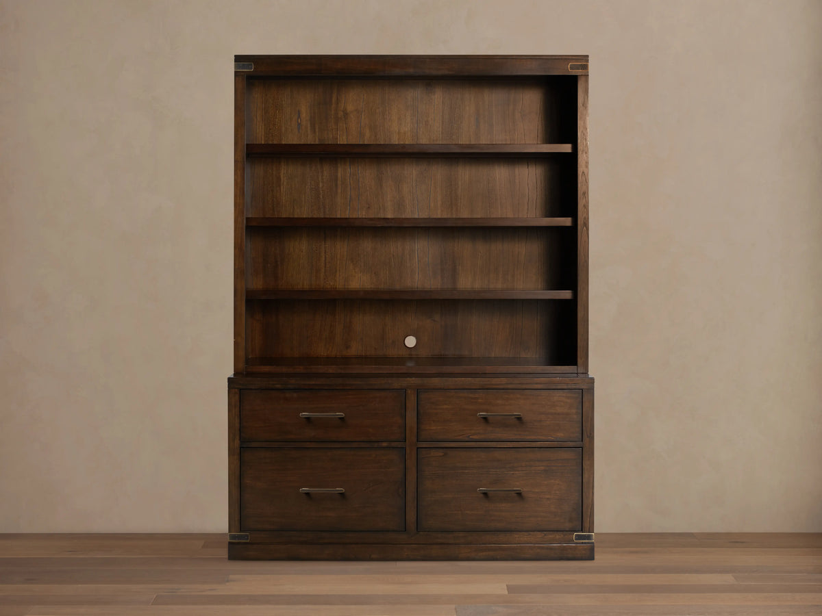 Dark brown Tremont Bookcase with four upper shelves, four lower drawers, and antique brass hardware.