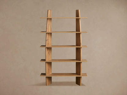 Viareggio Bookcase made of solid oak wood with five fixed shelves, displaying decorative items, against a beige wall.