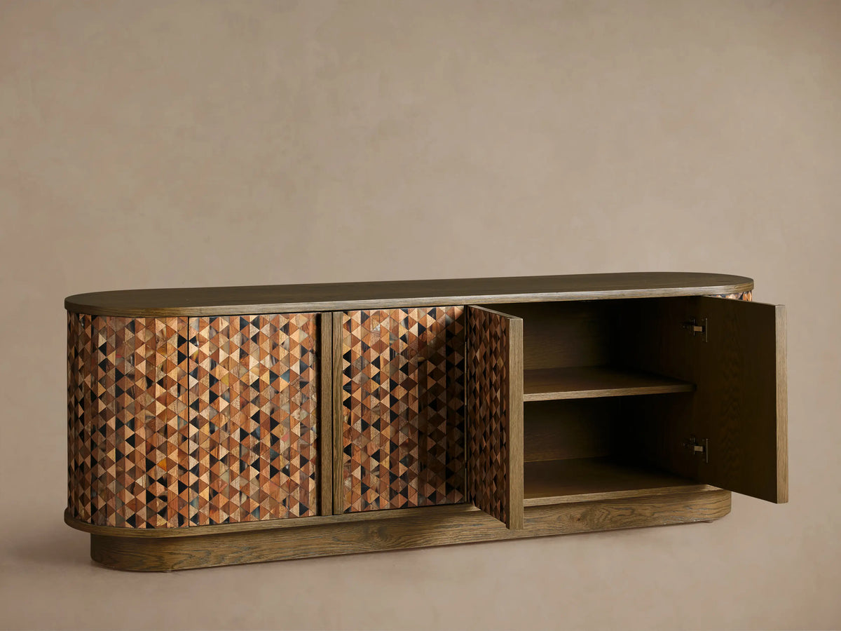 Zansi Sideboard with dark top, curved sides, 3 doors featuring a mosaic of varied brown and black horn and wood triangles.