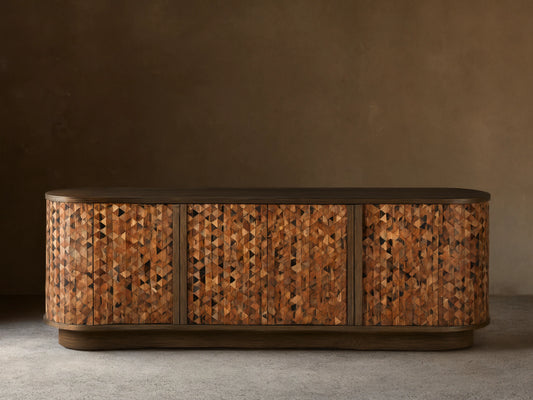 Zansi Sideboard with dark top, curved sides, 3 doors featuring a mosaic of varied brown and black horn and wood triangles.