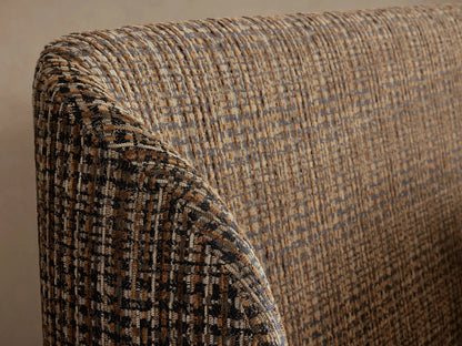 Adalynn Bed: Curved, upholstered headboard and bed frame in brown tweed fabric with white textured bedding.