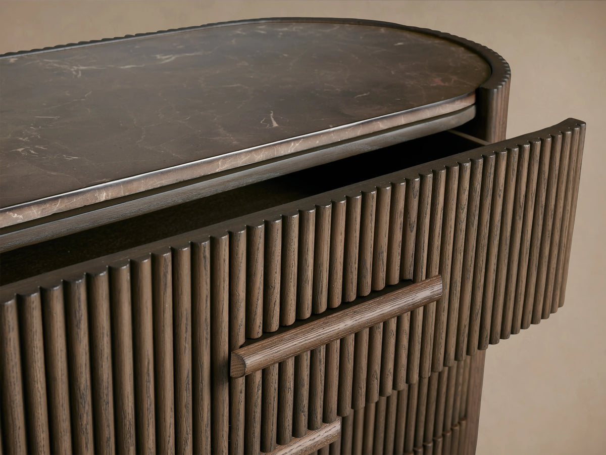 Astor Six-Drawer Dresser with oak wood reeding, inset marble top, and stone pulls; features two open drawers.